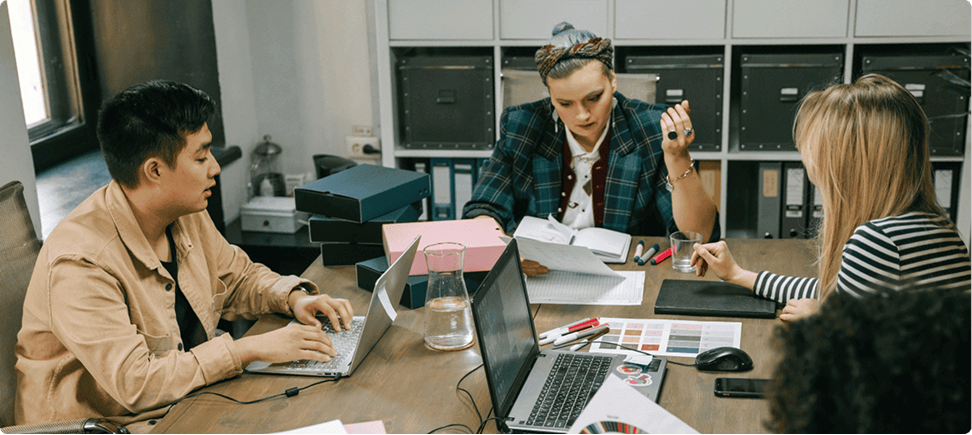 Product team planning the Heart Care app around a meeting table